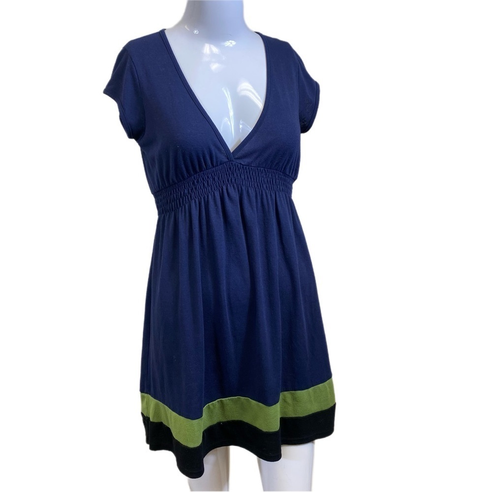 Miss Chievous size medium blue v neck dress with green trim at bottom